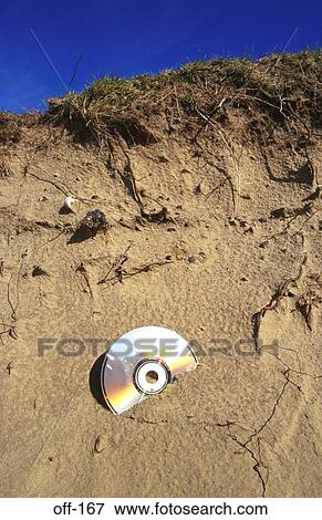 Stock Photo - CD ROM in Sand Bank. Fotosearch