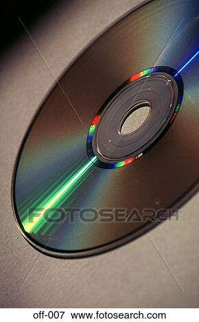 Stock Photo - CD-ROM on Desk. Fotosearch