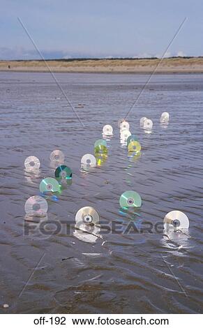 CD ROMs in Sand View Large Photo Image Stock Image - CD ROMs in Sand. Fotosearch