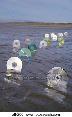 CD ROMs in Sand View Large Photo Image Stock Image - CD ROMs in Sand. Fotosearch