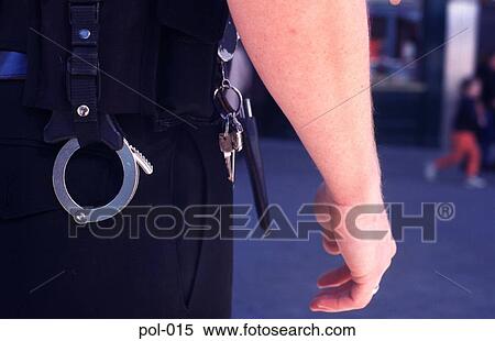 Stock Photography - Close Up of Policemans Belt while on Beat. Fotosearch
