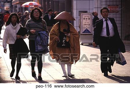 Stock Photograph - Contrasting Pedestrians Japan. Fotosearch