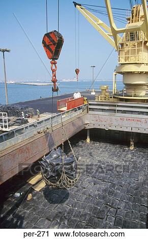 Stock Image - Crane unloading Cargo Lima Peru. Fotosearch