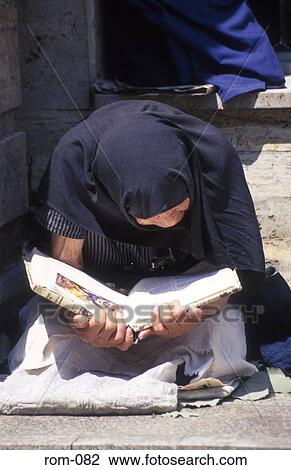 Crouched Old Woman Reading a Book Bucharest Romania View Large Photo Image Stock Image - Crouched Old Woman Reading a Book Bucharest Romania. Fotosearch