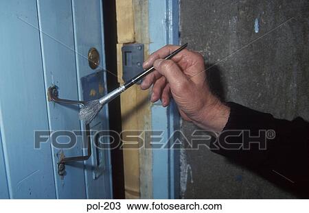 Stock Image - Dusting for Fingerprints UK. Fotosearch