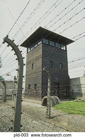 Electrified Barbed Wire Fence and Guard Tower Auschwitz Poland View Large Photo Image Stock Image - Electrified Barbed Wire Fence and Guard Tower Auschwitz Poland. Fotosearch