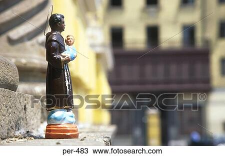 Stock Image - Figurine of a Monk Lima Peru. Fotosearch