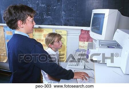 Girl and Boy Using School Computer View Large Photo Image Stock Image - Girl and Boy Using School Computer. Fotosearch