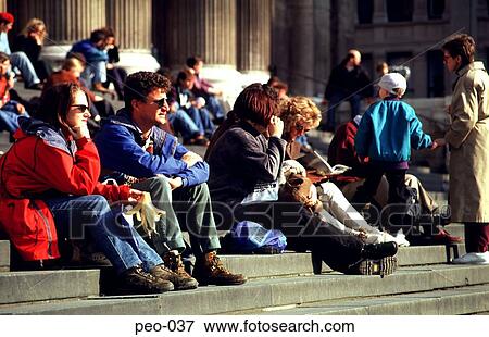 Group of Tourists Sitting on Steps View Large Photo Image Stock Photo - Group of Tourists Sitting on Steps. Fotosearch