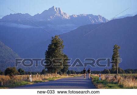 Jogging Couple Beneath Mountains New Zealand View Large Photo Image Stock Image - Jogging Couple Beneath Mountains New Zealand. Fotosearch