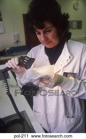 Laboratory Technician Examining Evidence UK View Large Photo Image Stock Image - Laboratory Technician Examining Evidence UK. Fotosearch