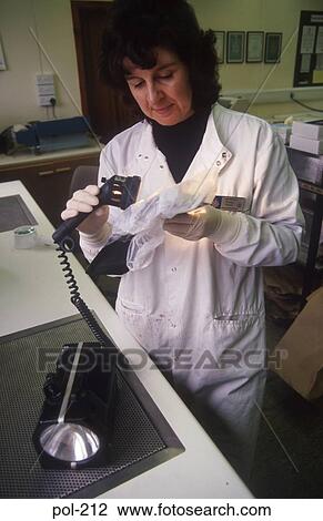 Laboratory Technician Examining Evidence UK View Large Photo Image Stock Image - Laboratory Technician Examining Evidence UK. Fotosearch