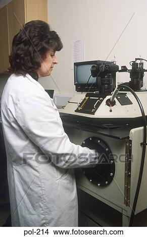 Picture - Laboratory Technician Testing Evidence UK. Fotosearch