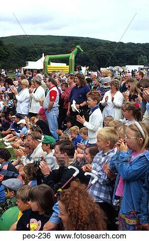 Stock Photograph - Large Audience at Open Air Event Wales. Fotosearch