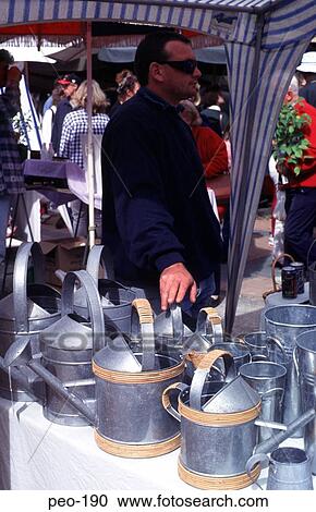 Man by Galvanised Steel Products Stand View Large Photo Image Stock Image - Man by Galvanised Steel Products Stand. Fotosearch