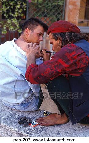 Man Getting Tattoo From Street Tattooist Italy View Large Photo Image Stock Image - Man Getting Tattoo From Street Tattooist Italy. Fotosearch