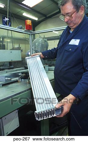 Man Handling Machinery View Large Photo Image Stock Photo - Man Handling Machinery. Fotosearch