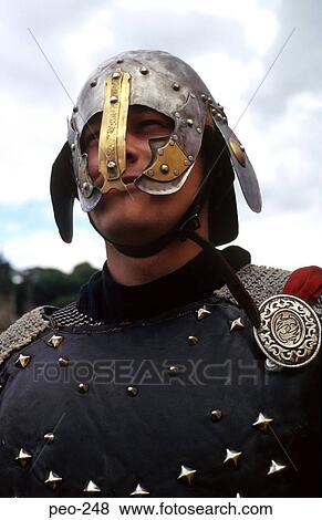 Stock Photo - Man in Medieval Armour at Reinactment England. Fotosearch