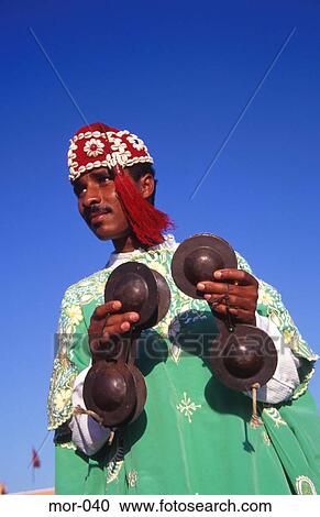 Man in Traditional Dress Playing Instrument Morocco View Large Photo Image Stock Image - Man in Traditional Dress Playing Instrument Morocco. Fotosearch