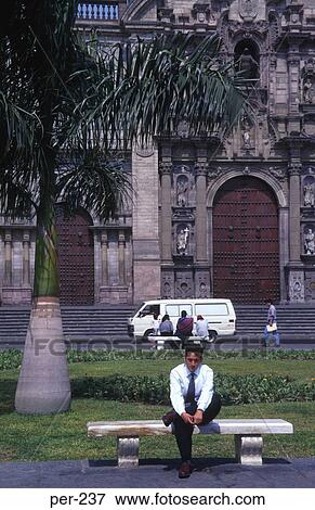 Man Sitting on Bench Liam Peru View Large Photo Image Stock Photo - Man Sitting on Bench Liam Peru. Fotosearch