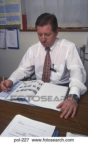 Stock Photo - Man Studying File UK. Fotosearch