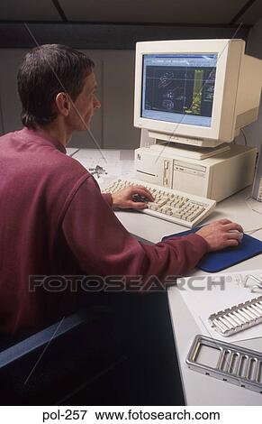 Man Using Technical Drawing Computer Software UK View Large Photo Image Stock Photo - Man Using Technical Drawing Computer Software UK. Fotosearch