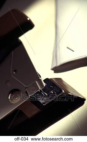 Office Stapler and Paper on Desk View Large Photo Image Picture - Office Stapler and Paper on Desk. Fotosearch