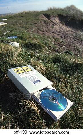 Open CD ROM Drive on Grass Bank View Large Photo Image Stock Photo - Open CD ROM Drive on Grass Bank. Fotosearch