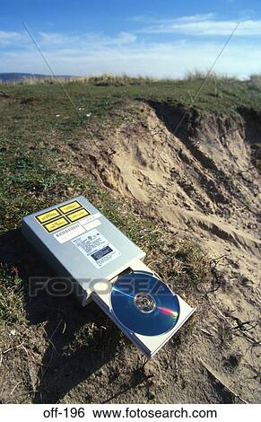 Open CD ROM Drive on Grass Bank View Large Photo Image Stock Photograph - Open CD ROM Drive on Grass Bank. Fotosearch