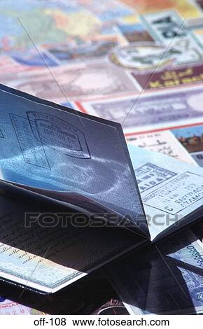Open Dark Blue UK Passport on Foreign Banknotes View Large Photo Image Stock Photo - Open Dark Blue UK Passport on Foreign Banknotes. Fotosearch