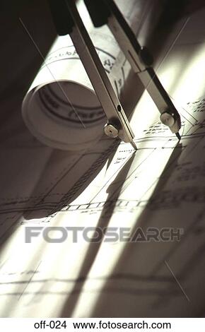 Pair of Compasses and Paper Plans View Large Photo Image Picture - Pair of Compasses and Paper Plans. Fotosearch