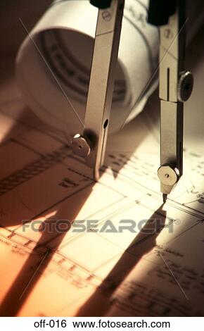 Pair of Compasses and Paper Plans under Tinted Light View Large Photo Image Stock Photograph - Pair of Compasses and Paper Plans under Tinted Light. Fotosearch