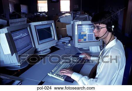 Police Dispatcher at Computer Terminal View Large Photo Image Picture - Police Dispatcher at Computer Terminal. Fotosearch