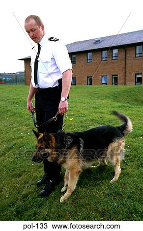 Stock Image - Police Dog with Handler. Fotosearch
