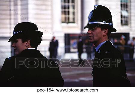Policeman and Policewoman UK View Large Photo Image Picture - Policeman and Policewoman UK. Fotosearch