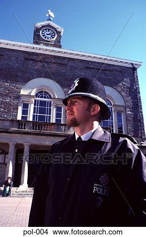 Policeman in front of Old Town Hall View Large Photo Image Picture - Policeman in front of Old Town Hall. Fotosearch