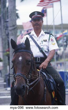 Policeman on Horseback Kuala Lumpur Malaysia View Large Photo Image Stock Photograph - Policeman on Horseback Kuala Lumpur Malaysia. Fotosearch