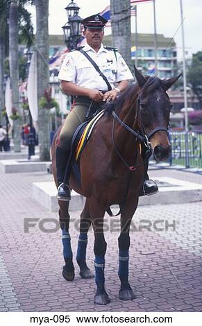 Policeman on Horseback Kuala Lumpur Malaysia View Large Photo Image Stock Photography - Policeman on Horseback Kuala Lumpur Malaysia. Fotosearch