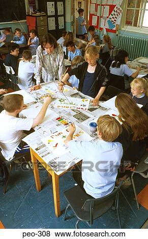 Primary School Children Painting in Class Wales View Large Photo Image Stock Photo - Primary School Children Painting in Class Wales. Fotosearch