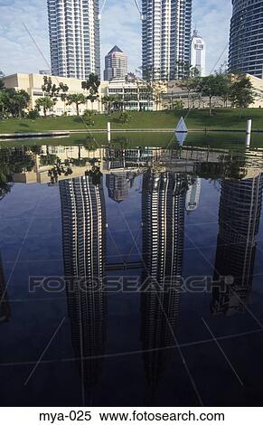 Reflection of Petronas Towers Kuala Lumpur Malaysia View Large Photo Image Stock Photography - Reflection of Petronas Towers Kuala Lumpur Malaysia. Fotosearch
