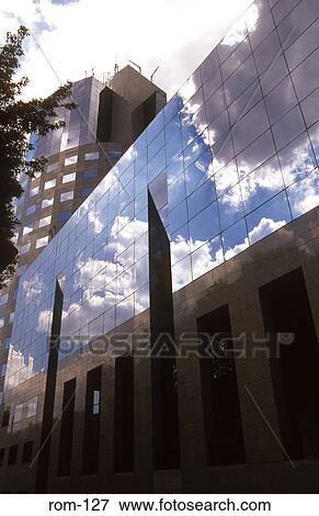 Reflections in a Glass Office Block Bucharest Romania View Large Photo Image Stock Photo - Reflections in a Glass Office Block Bucharest Romania. Fotosearch