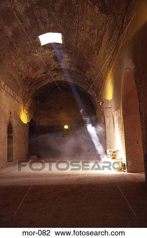 Stock Image - Shaft of Sunlight in Building Meknes Morocco. Fotosearch