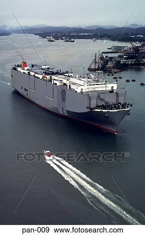 Speedboat Passing Container Ship Panama Canal View Large Photo Image Stock Photo - Speedboat Passing Container Ship Panama Canal. Fotosearch