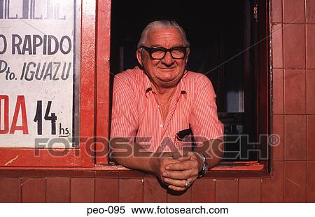 Ticket Collector Looking out of his Booth Argentina View Large Photo Image Stock Photography - Ticket Collector Looking out of his Booth Argentina. Fotosearch