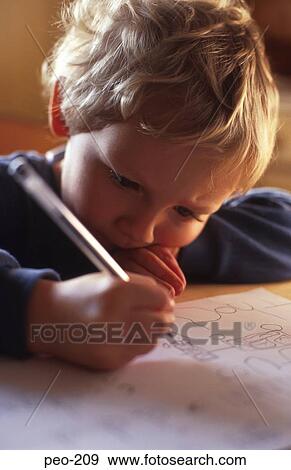 Stock Photo - Toddler Drawing with Ball Point Pen. Fotosearch