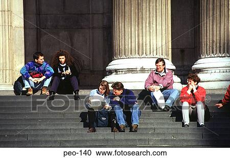 Tourists Sitting on Steps at St Pauls Cathedral View Large Photo Image Stock Image - Tourists Sitting on Steps at St Pauls Cathedral. Fotosearch