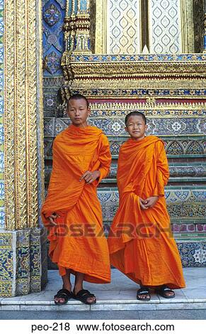 Stock Photo - Trainee Monks in Orange Robes Thailand. Fotosearch