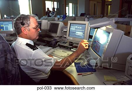 Uniformed Police Man using Computer Touch Screen View Large Photo Image Stock Image - Uniformed Police Man using Computer Touch Screen. Fotosearch