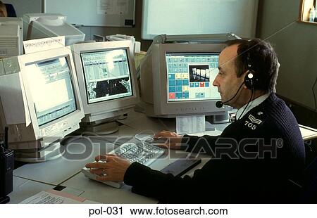 Uniformed Police Man using Telephone Headset View Large Photo Image Stock Image - Uniformed Police Man using Telephone Headset. Fotosearch