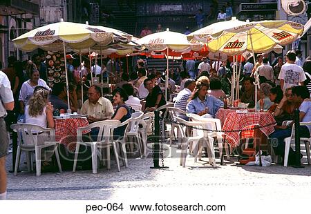 View of a Group of Tourists in a Cafe View Large Photo Image Picture - View of a Group of Tourists in a Cafe. Fotosearch